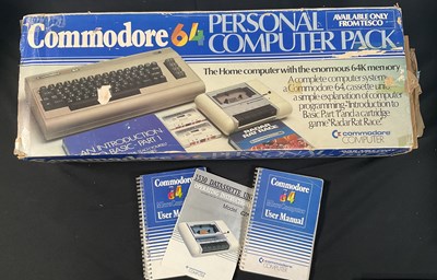 Lot 393 - COMMODORE - A boxed COMMODORE 64 and COMMODORE...