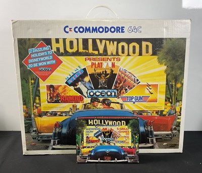 Lot 393 - COMMODORE - A boxed COMMODORE 64 and COMMODORE...
