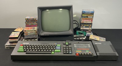 Lot 377 - AMSTRAD - An Amstrad CPC 464 computer bundle...