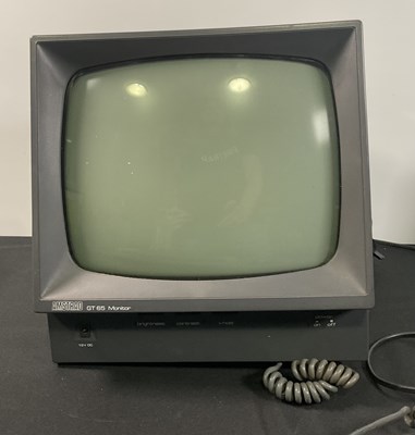 Lot 377 - AMSTRAD - An Amstrad CPC 464 computer bundle...