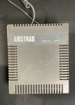 Lot 377 - AMSTRAD - An Amstrad CPC 464 computer bundle...