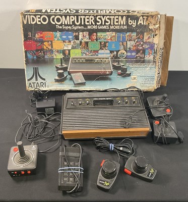 Lot 382 - ATARI - An Atari 2600 console with joysticks,...