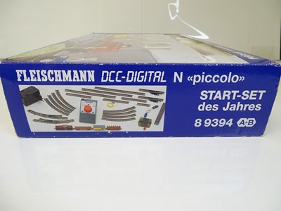 Lot 52 - N SCALE MODEL RAILWAYS: A FLEISCHMANN 8 9394...