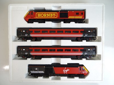 Lot 551 - OO SCALE MODEL RAILWAYS: A HORNBY 4 car HST...