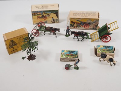 Lot 114 - A group of BRITAINS boxed diecast farm carts,...