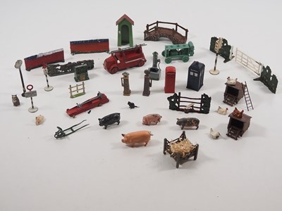 Lot 117 - A mixed group of diecast vehicles, animals and...