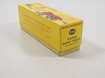 Lot 119 - A DINKY 959 FODEN DUMP TRUCK, red body, silver...