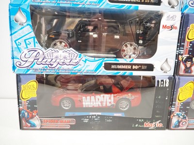 Lot 131 - A group of 1:18 scale MAISTO diecast cars, all...