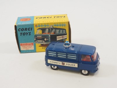 Lot 145 - A CORGI 464 Commer Police Van with flashing...