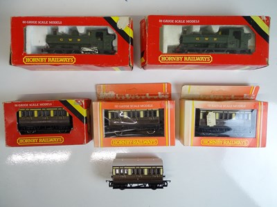 Lot 561 - OO SCALE MODEL RAILWAYS: A group of rolling...