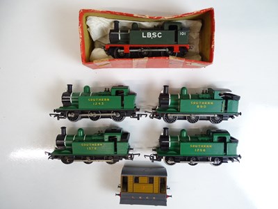 Lot 563 - OO SCALE MODEL RAILWAYS: A group of TRI-ANG /...