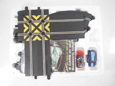 Lot 270 - A SCALEXTRIC 'Inner City Speed' slot racing...