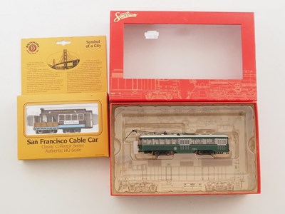 Lot 305 - A pair of HO gauge American outline street /...