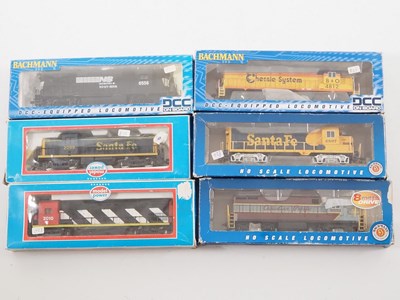 Lot 311 - A group of HO gauge American outline diesel...