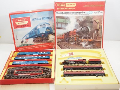 Lot 332 - A pair of TRI-ANG HORNBY OO gauge train sets...