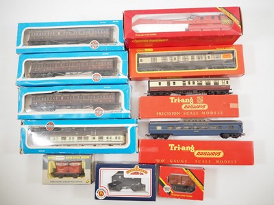 Lot 333 - A group of OO gauge rolling stock by HORNBY,...