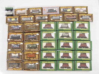 Lot 370 - A large group of mixed OO gauge wagons mostly...