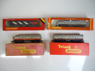 Lot 580 - OO SCALE MODEL RAILWAYS: A group of TRI-ANG...
