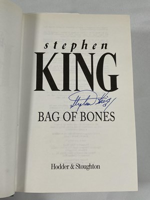 Lot 54 - An autographed copy of 'Bag of Bones' signed...