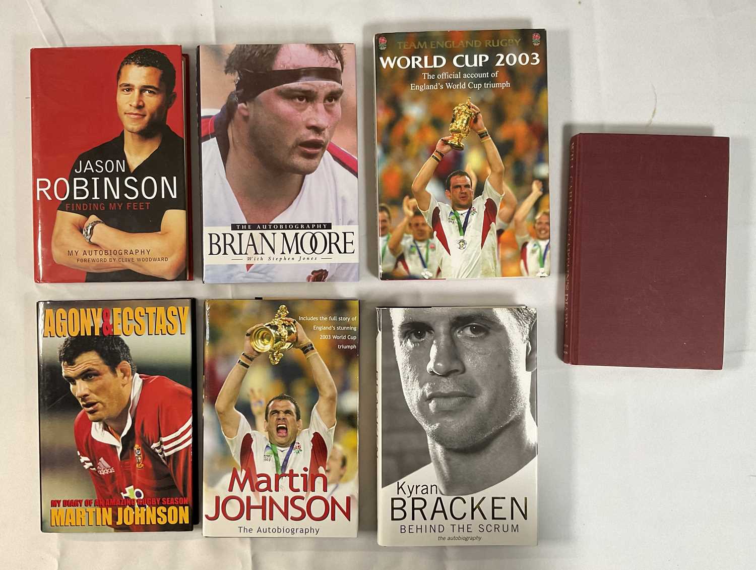 Lot 9 - SPORT - A group of Rugby player signed books...