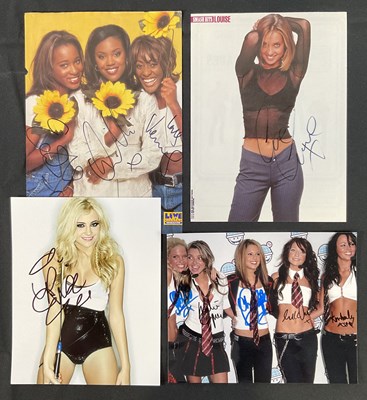 Lot 146 - A group of female musician signed stills and...