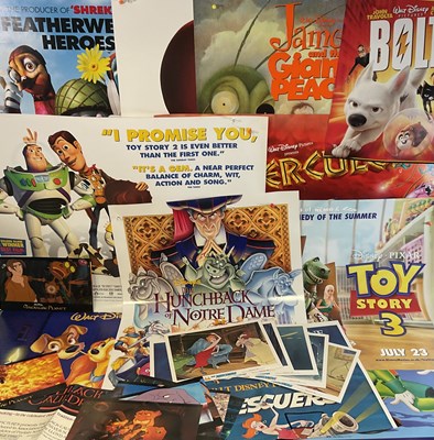 Lot 226 - WALT DISNEY: A large group of Disney animated...