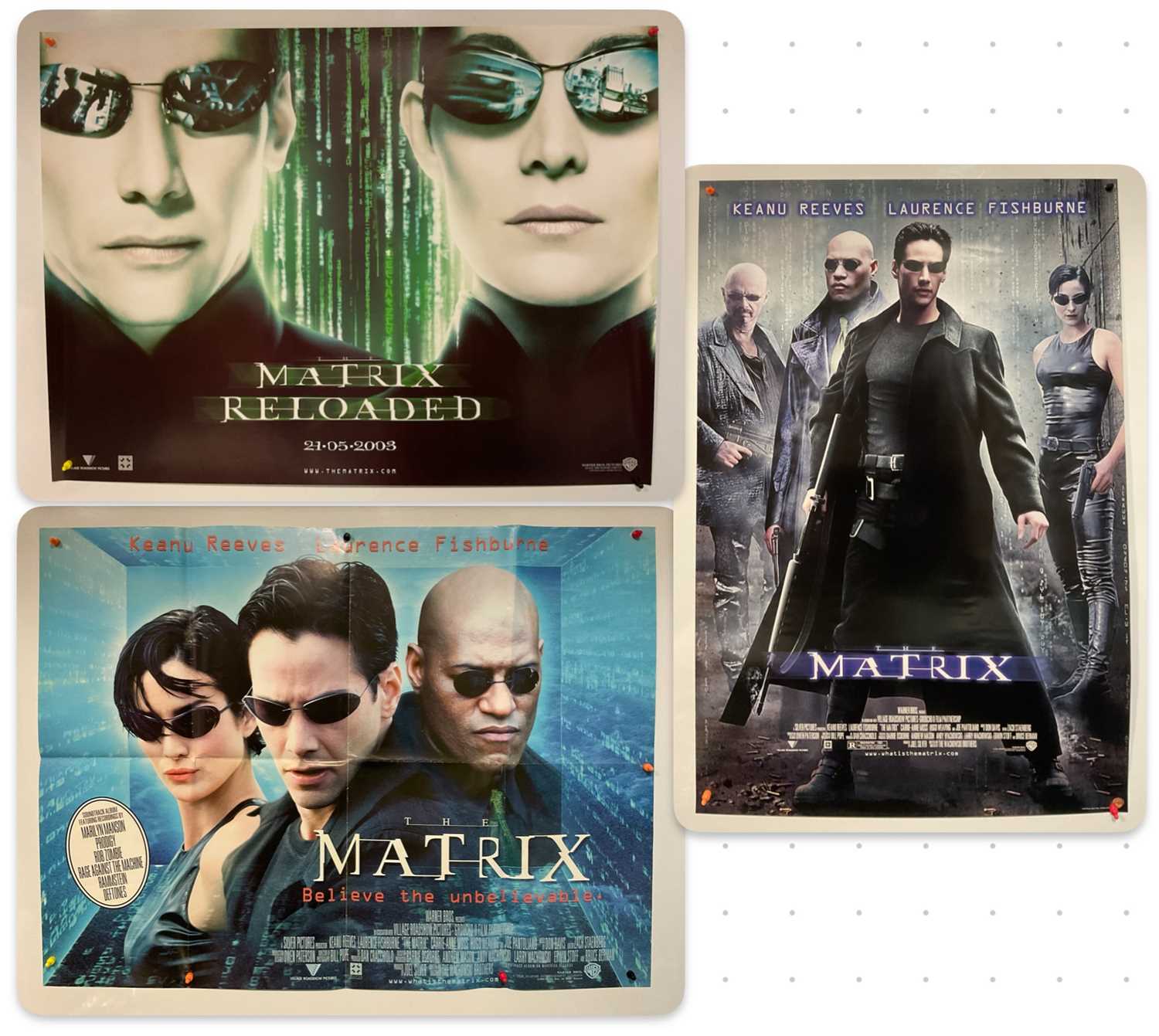 Lot 284 - THE MATRIX: A group of three film posters...