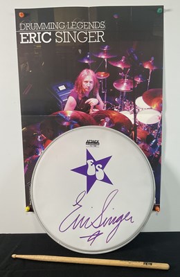 Lot 429 - An ERIC SINGER signed drum skin, gig used drum...