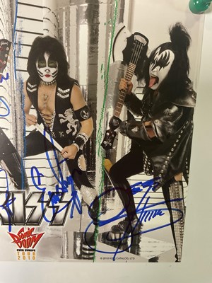 Lot 527 - A KISS 2010 Sonic Boom tour photo card signed...