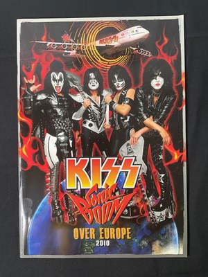 Lot 527 - A KISS 2010 Sonic Boom tour photo card signed...
