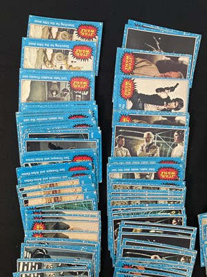 Lot 486 - A collection of 1977 STAR WARS Topps trading...