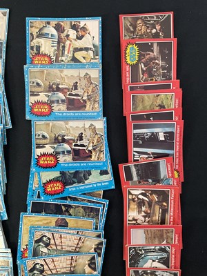 Lot 486 - A collection of 1977 STAR WARS Topps trading...
