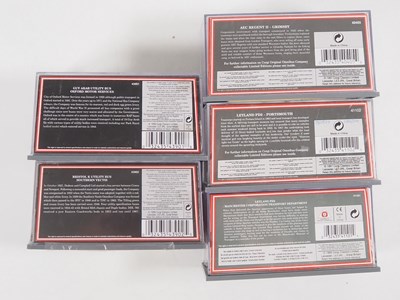 Lot 2 - A group of 1:76 scale 16 CORGI OOC buses in...