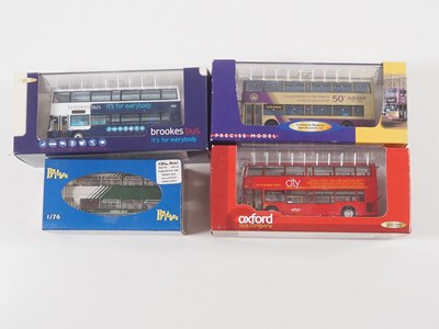 Lot 21 - A group of 1:76 scale double deck buses by...