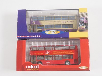 Lot 21 - A group of 1:76 scale double deck buses by...
