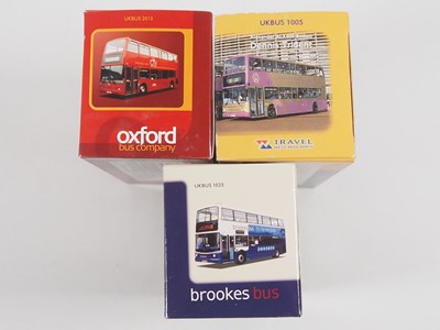 Lot 21 - A group of 1:76 scale double deck buses by...