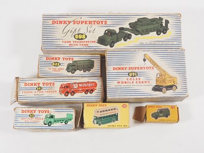 Lot 29 - A group of eight boxed DINKY diecast vehicles...