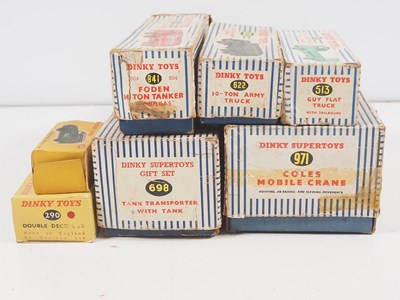 Lot 29 - A group of eight boxed DINKY diecast vehicles...