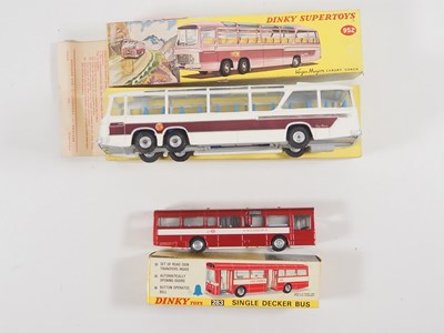 Lot 32 - A pair of boxed diecast buses comprising a...