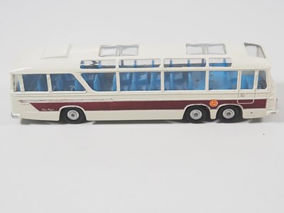 Lot 32 - A pair of boxed diecast buses comprising a...