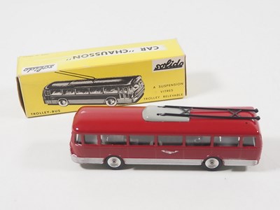 Lot 34 - A SOLIDO 52 diecast trolley-bus in maroon with...