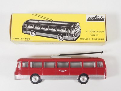 Lot 34 - A SOLIDO 52 diecast trolley-bus in maroon with...