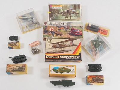 Lot 58 - A group of military based toys to include a...