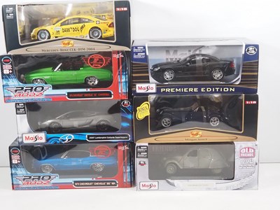 Lot 102 - A group of MAISTO 1:18 scale diecast cars, all...