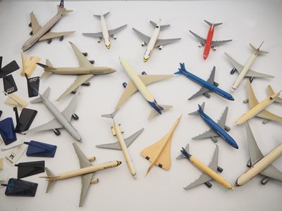 Lot 149 - A group of plastic display airplanes in...