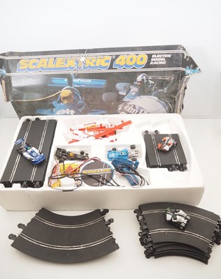 Lot 150 - A SCALEXTRIC 400 vintage slot racing set in...