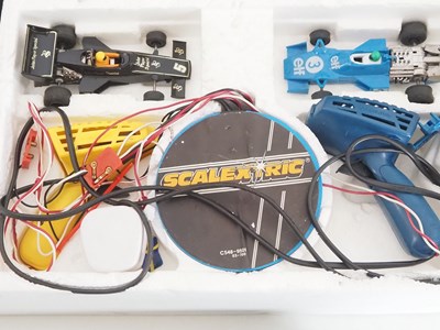 Lot 150 - A SCALEXTRIC 400 vintage slot racing set in...