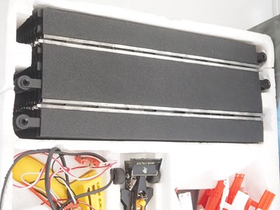 Lot 150 - A SCALEXTRIC 400 vintage slot racing set in...