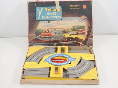 Lot 157 - A TRI-ANG MINIC Motorways set comprising track,...