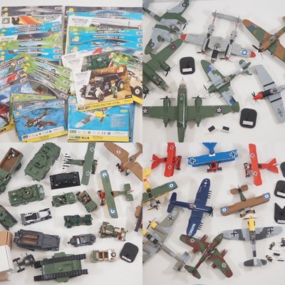 Lot 160 - A very large group of built COBI building...